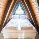 Rhön-Auszeit, moderne Ferienwohnungen für Naturliebhaber / Doppelbett im Ferienhaus Rhön-Auszeit